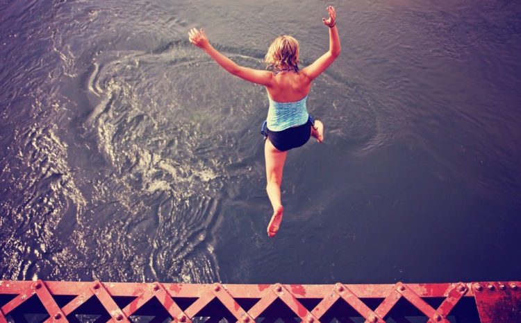 brave woman jumping off bridge