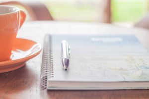 pen and notebook preparing for psychic readings